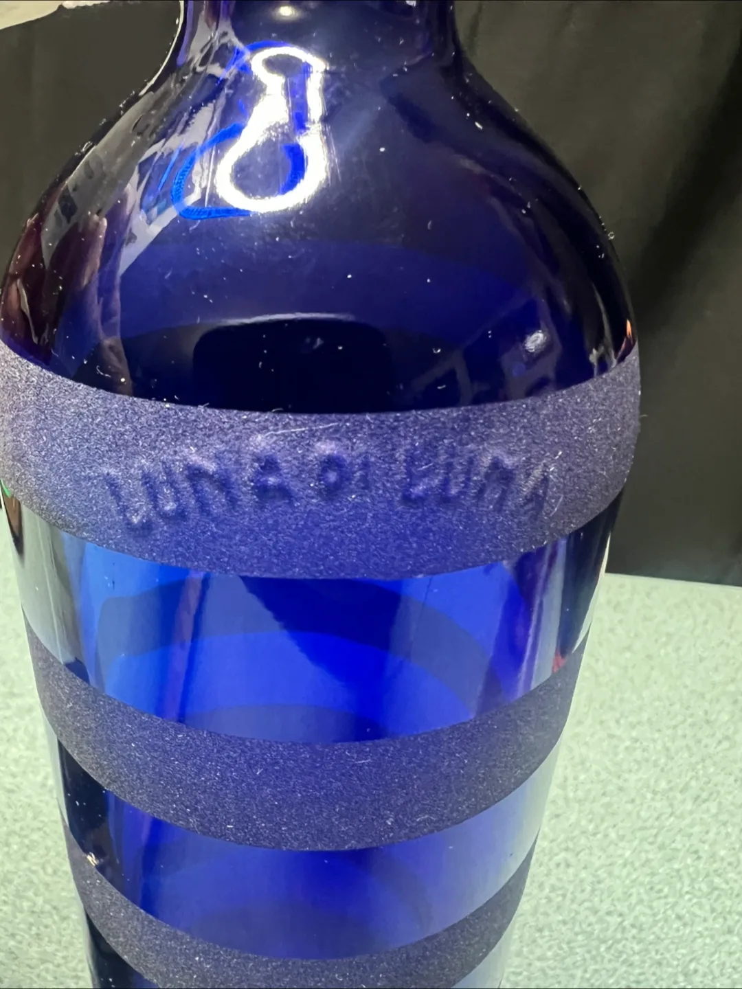 Vintage bottles, Luna a Luna cobalt blue and a clear bottle image indicator(3)
