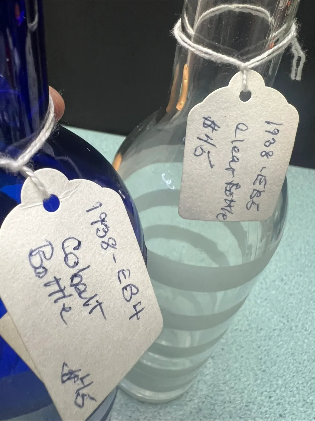 Vintage bottles, Luna a Luna cobalt blue and a clear bottle image indicator(8)