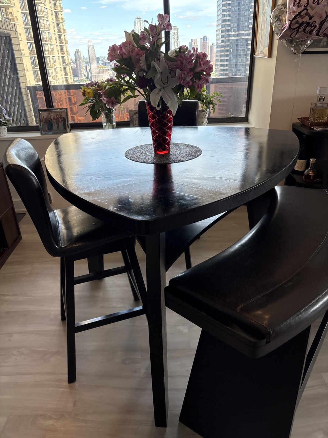 Black Triangle Table with Two Stools and Bench