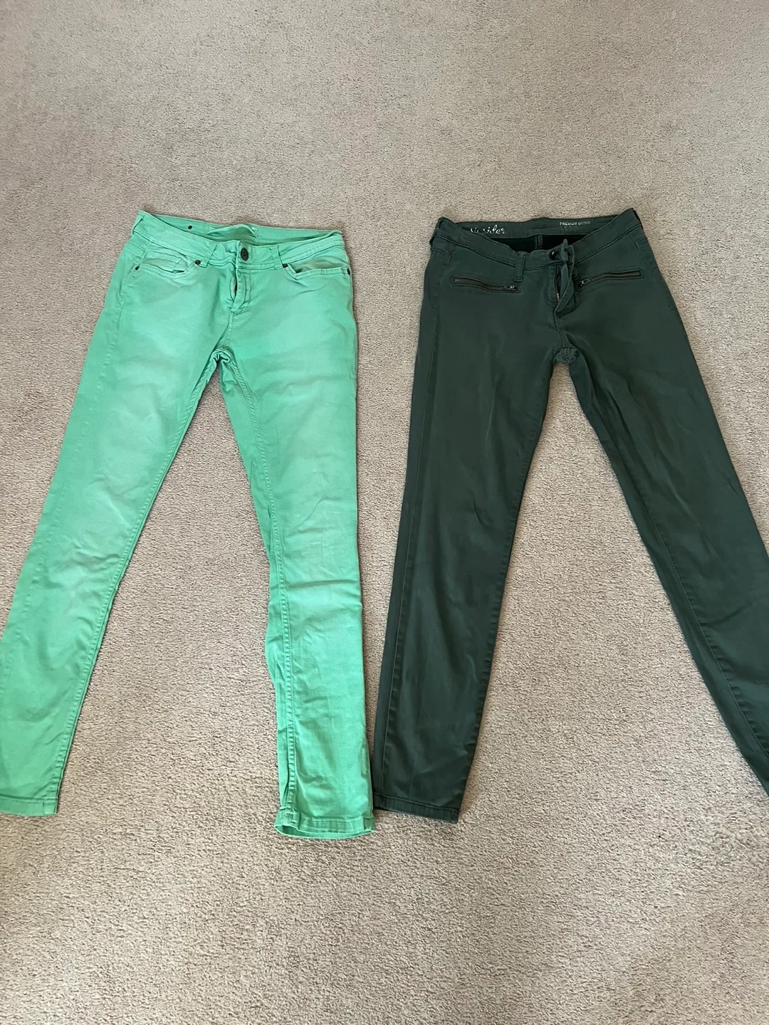 Two pairs of women's pants, mint green and dark green image indicator(2)
