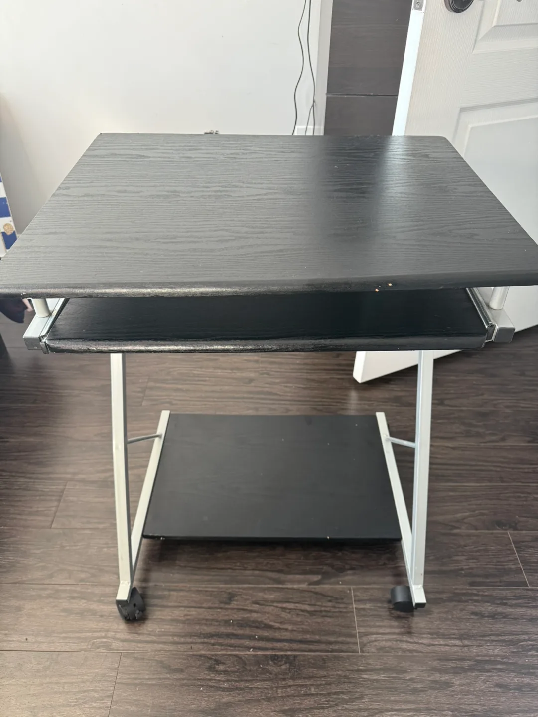 Small black computer desk with keyboard tray and wheels thumbnail