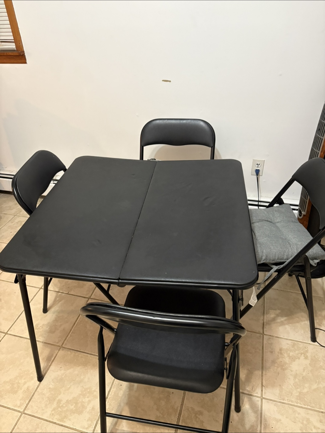 Black Foldable Table with Four Chairs