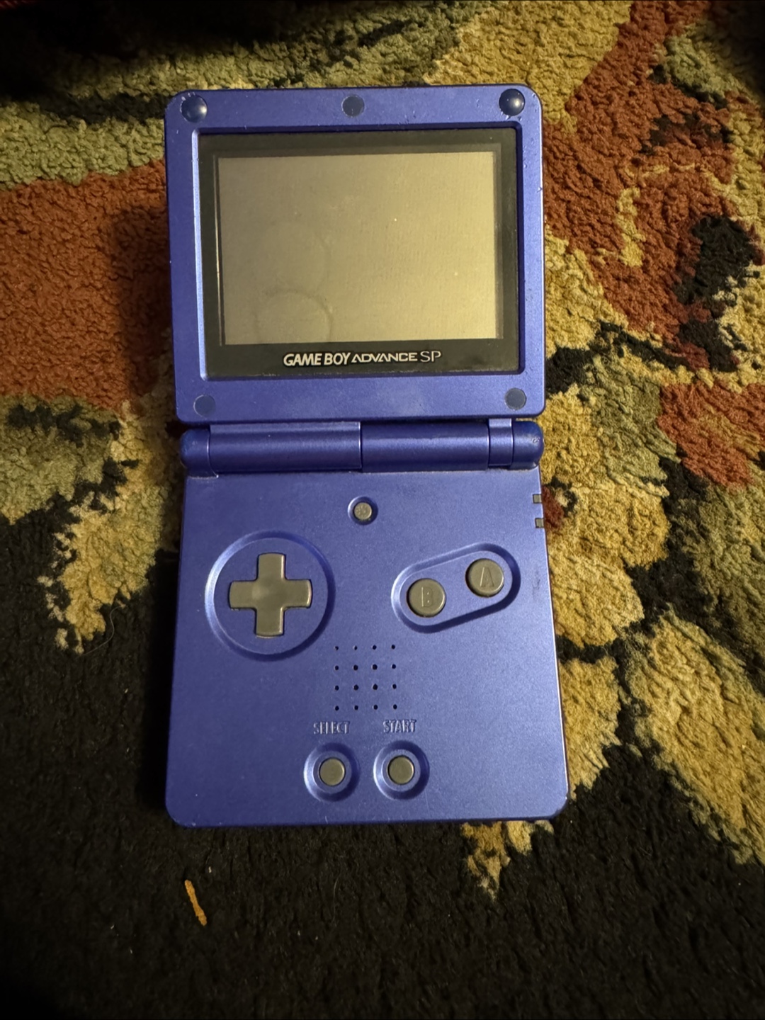 Game Boy Advance SP with charger