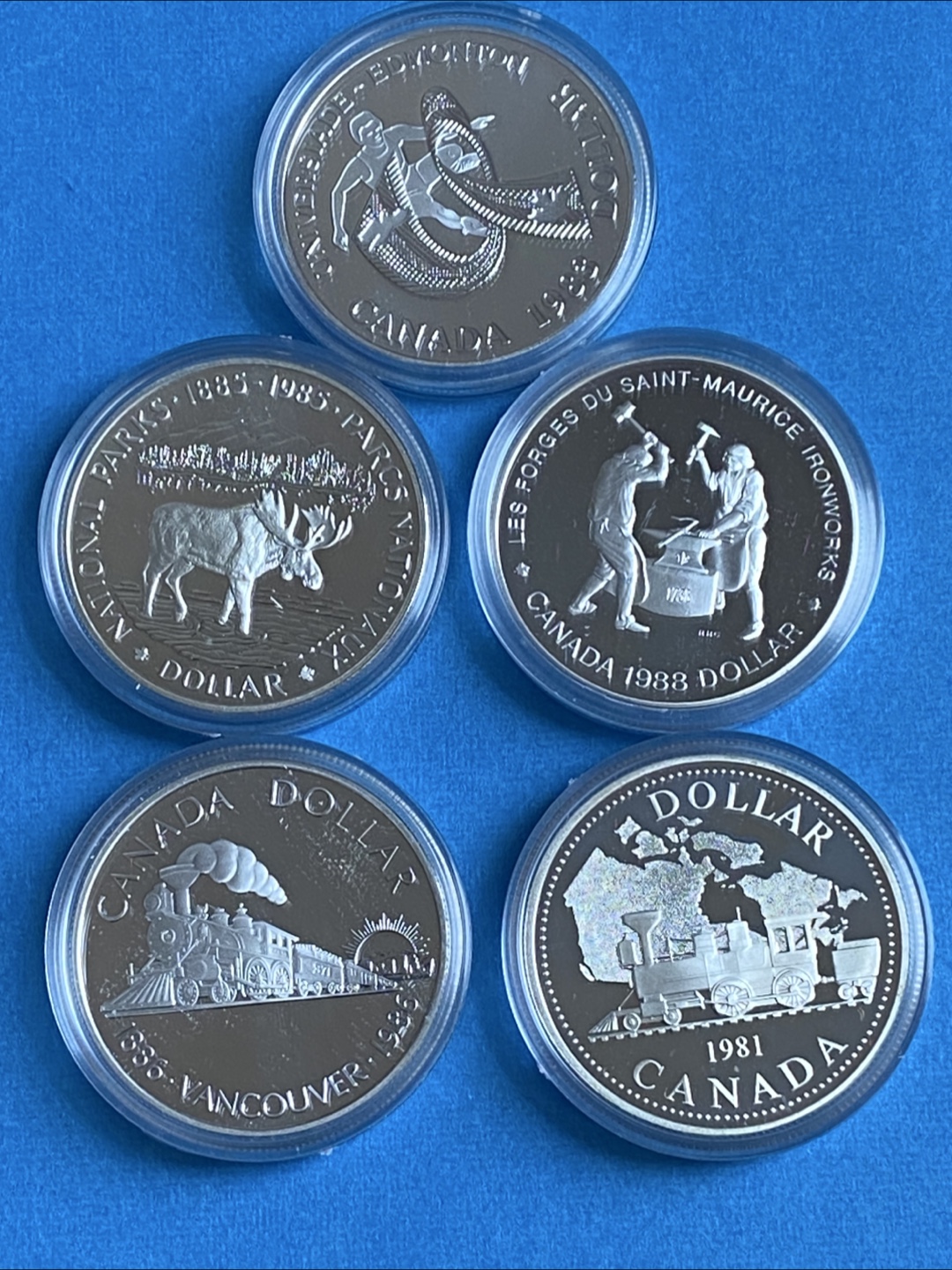 Collection of Canadian Silver Dollar Coins - photo 3