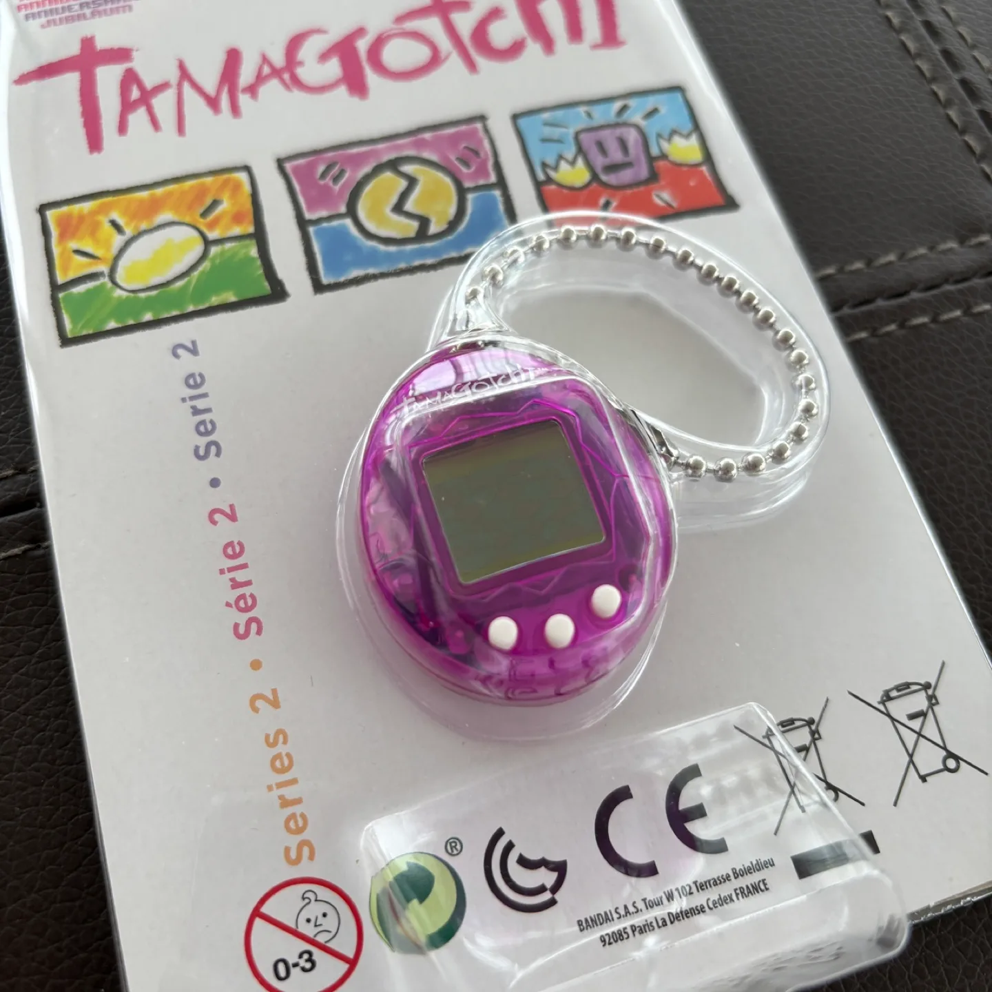 Mini Tamagotchi 20th Anniversary Edition Purple Virtual Pet thumbnail