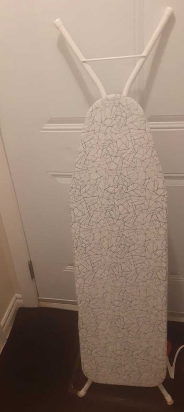 White Ironing Board with Craquelure Pattern