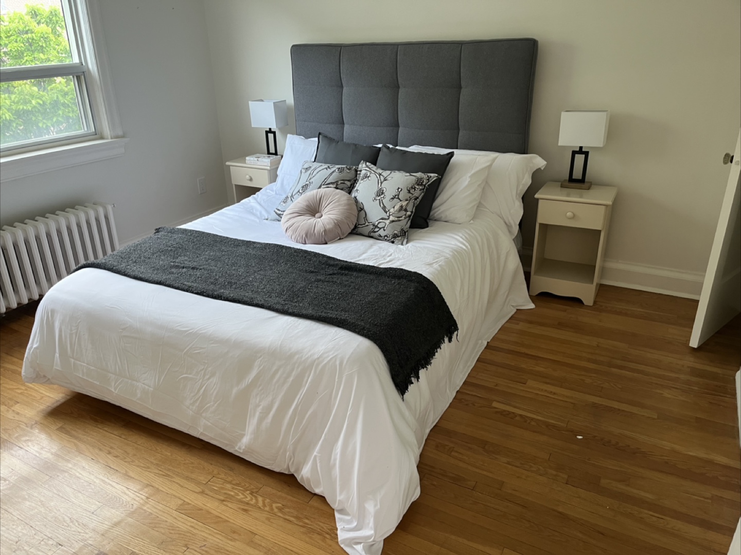 Grey upholstered queen bed
