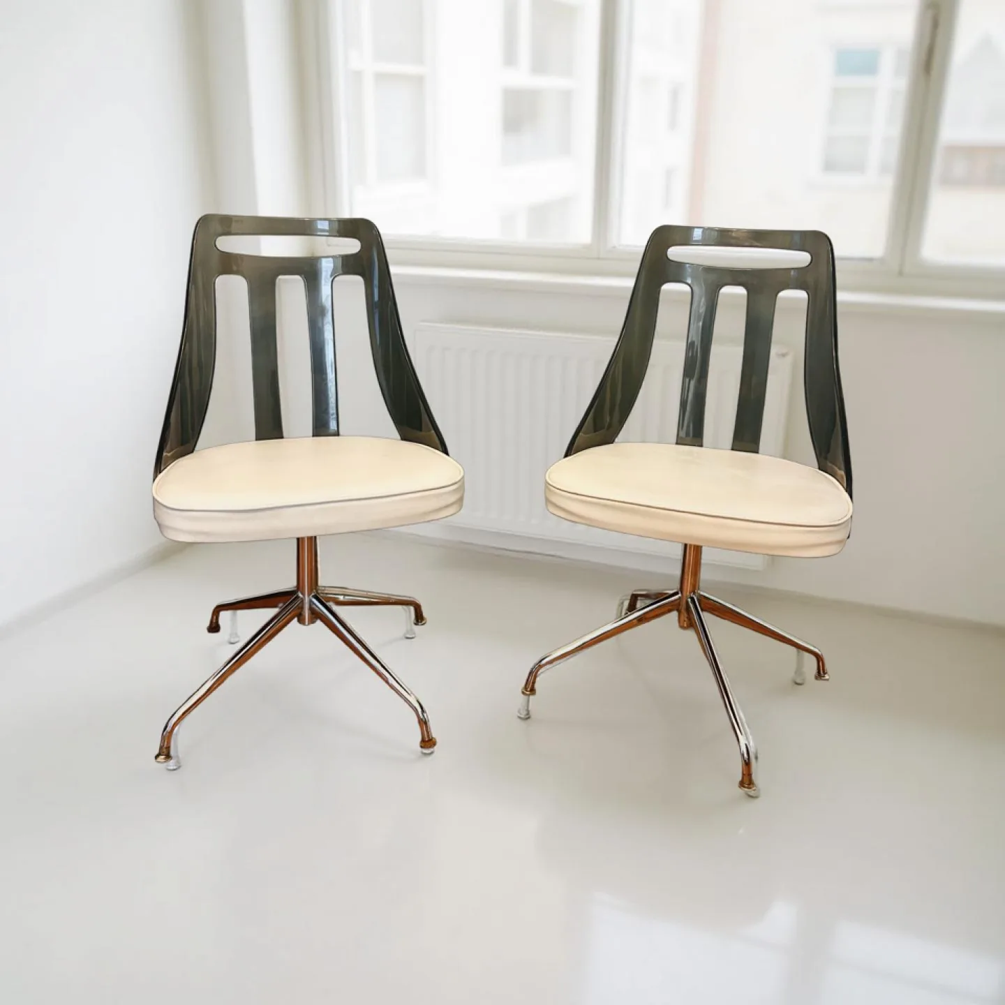 Pair of Mid-Century Modern Swivel Chairs thumbnail