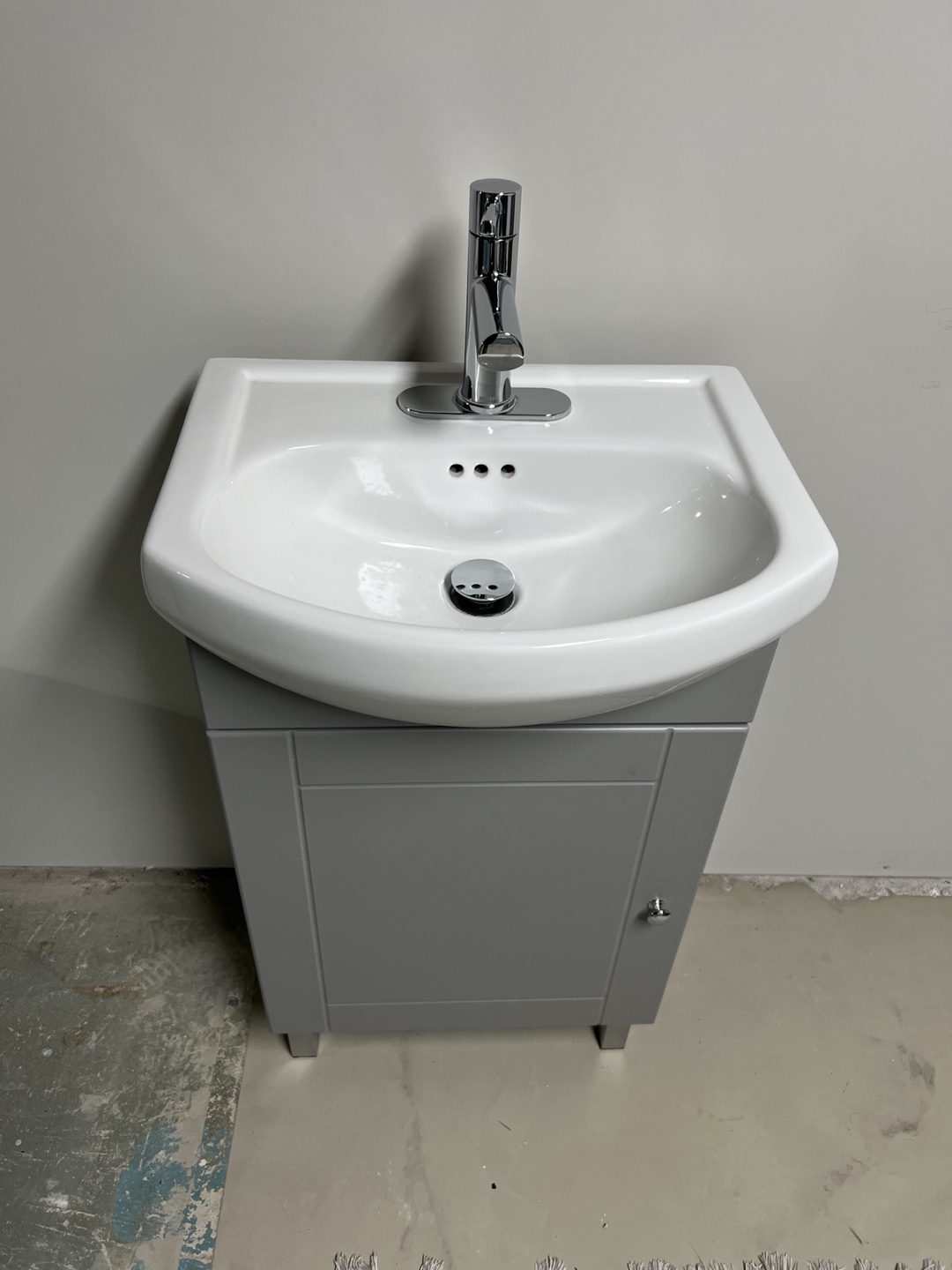 Grey Bathroom Vanity with White Sink and Chrome Faucet
