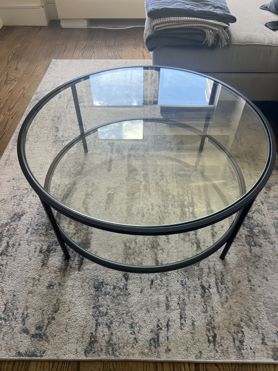 Round Glass Coffee Table with Black Metal Frame
