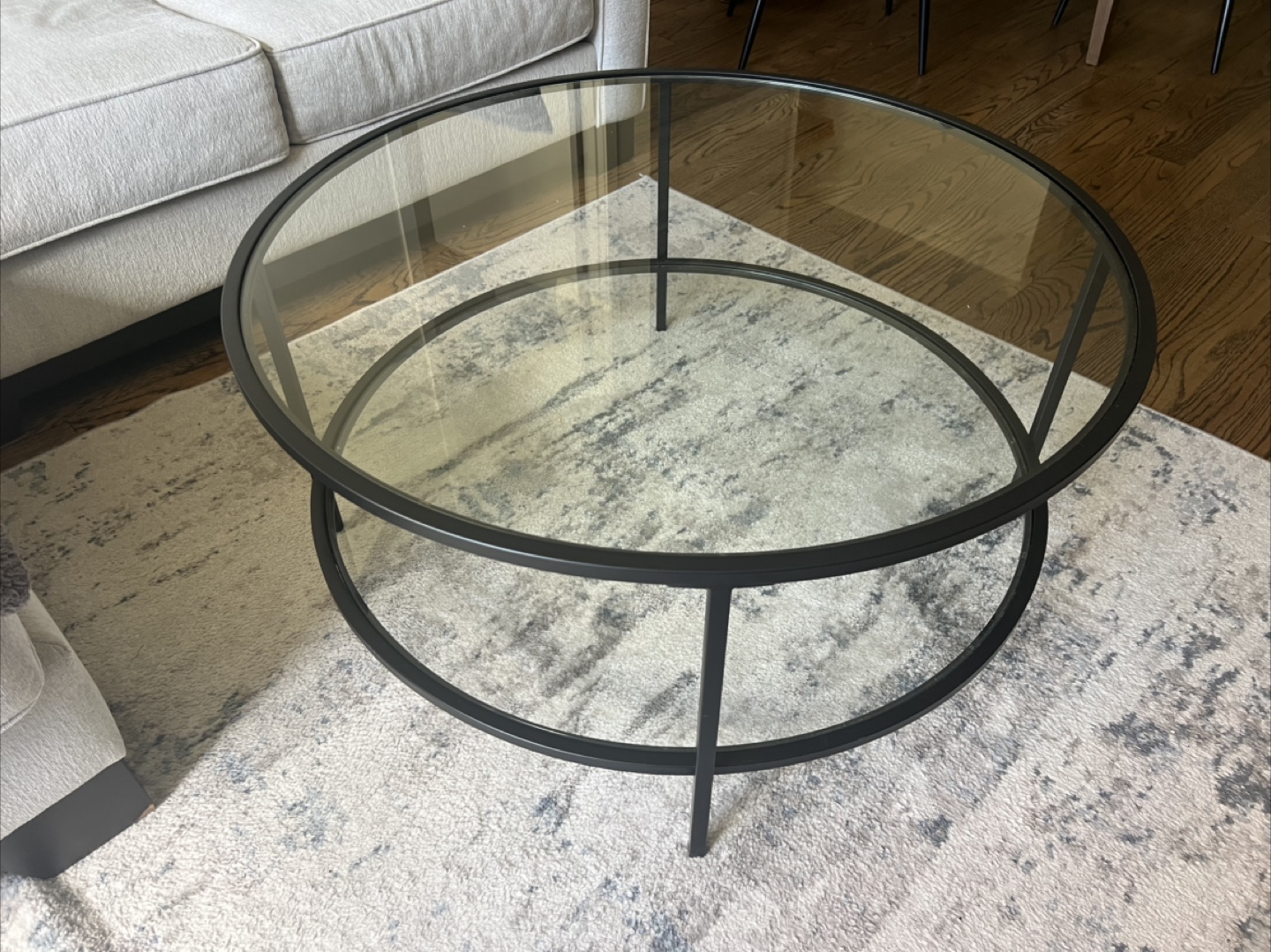 Round Glass Coffee Table with Black Metal Frame - photo 2