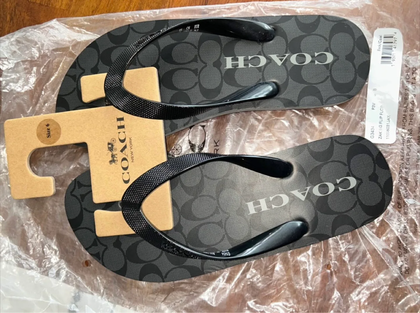 COACH women's Size 6 Black Flip Flops thumbnail