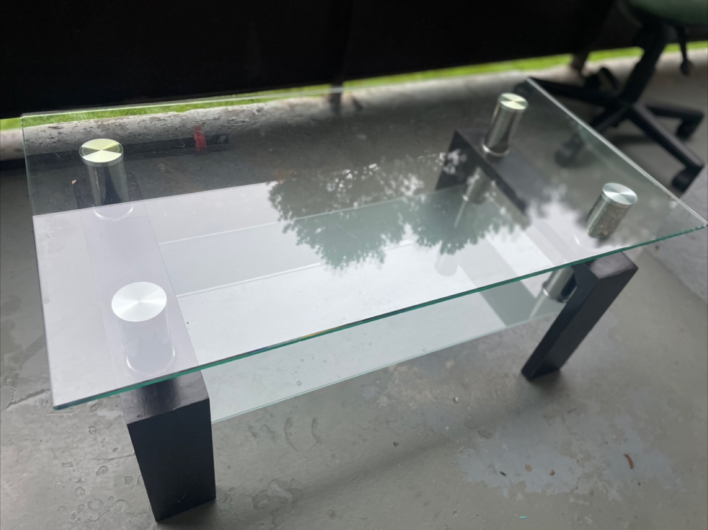 Glass and dark wood coffee table