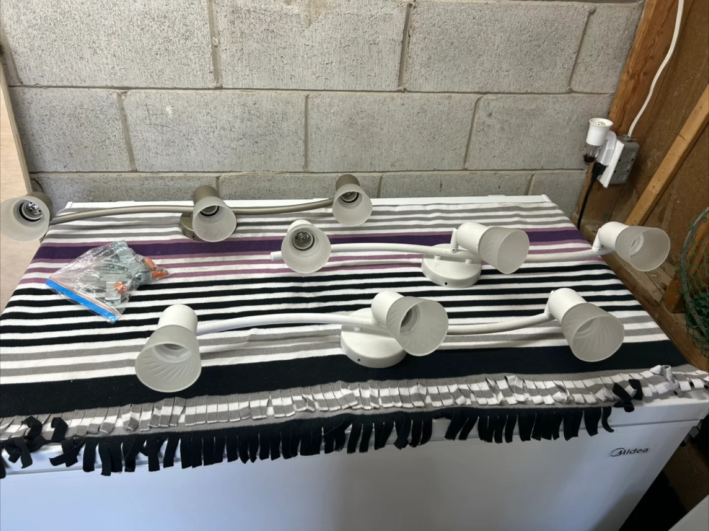 Two sets of three-light vanity bar fixtures thumbnail