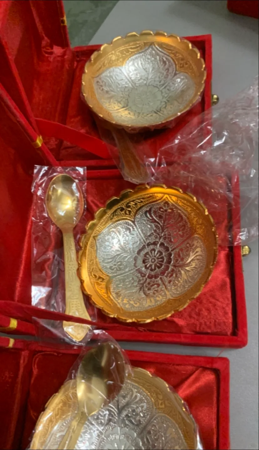 Set of Three Gold and Silver Bowls with Spoons image indicator(3)