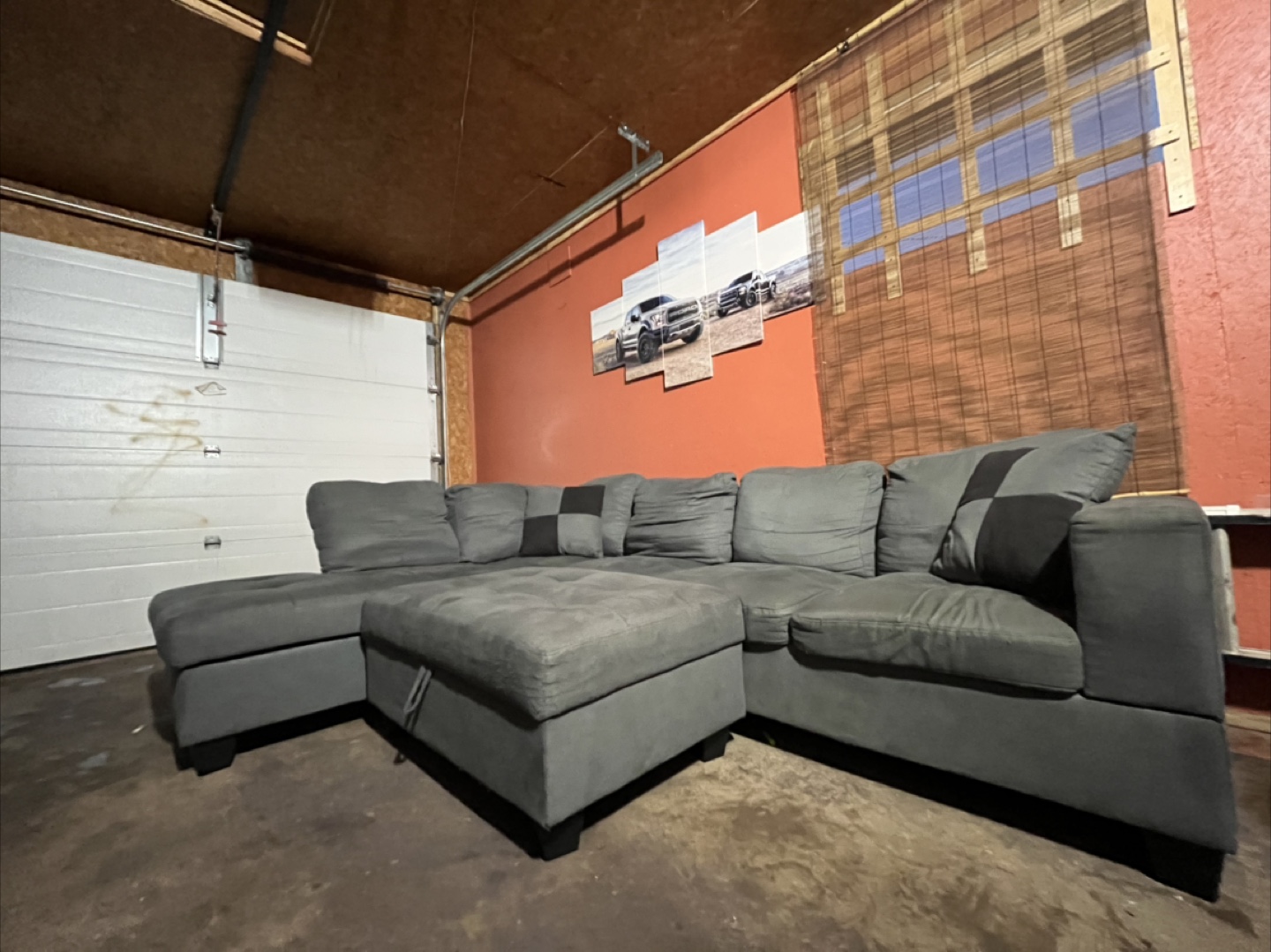 Large light grey sectional with ottoman