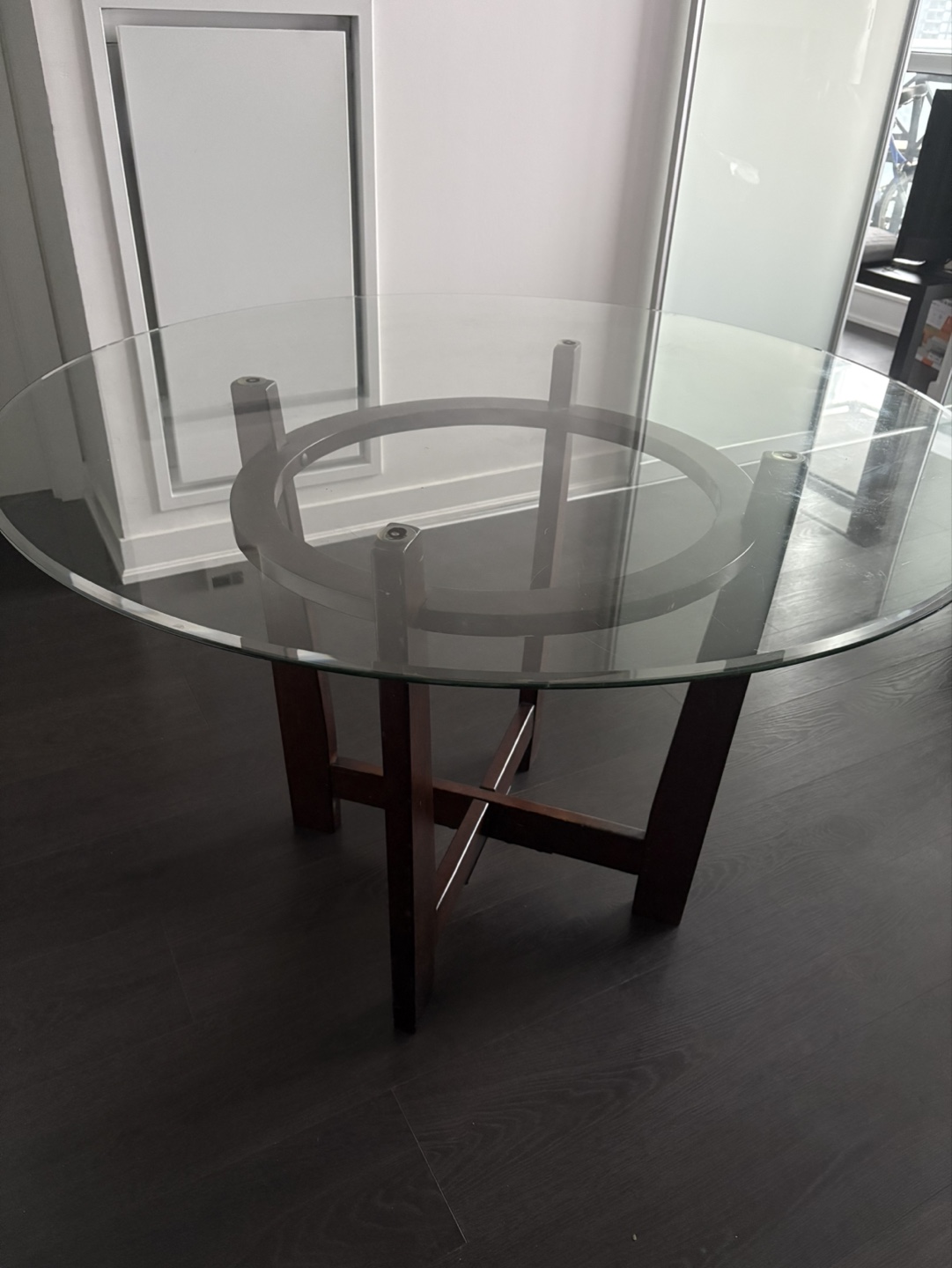 Glass-top dining table