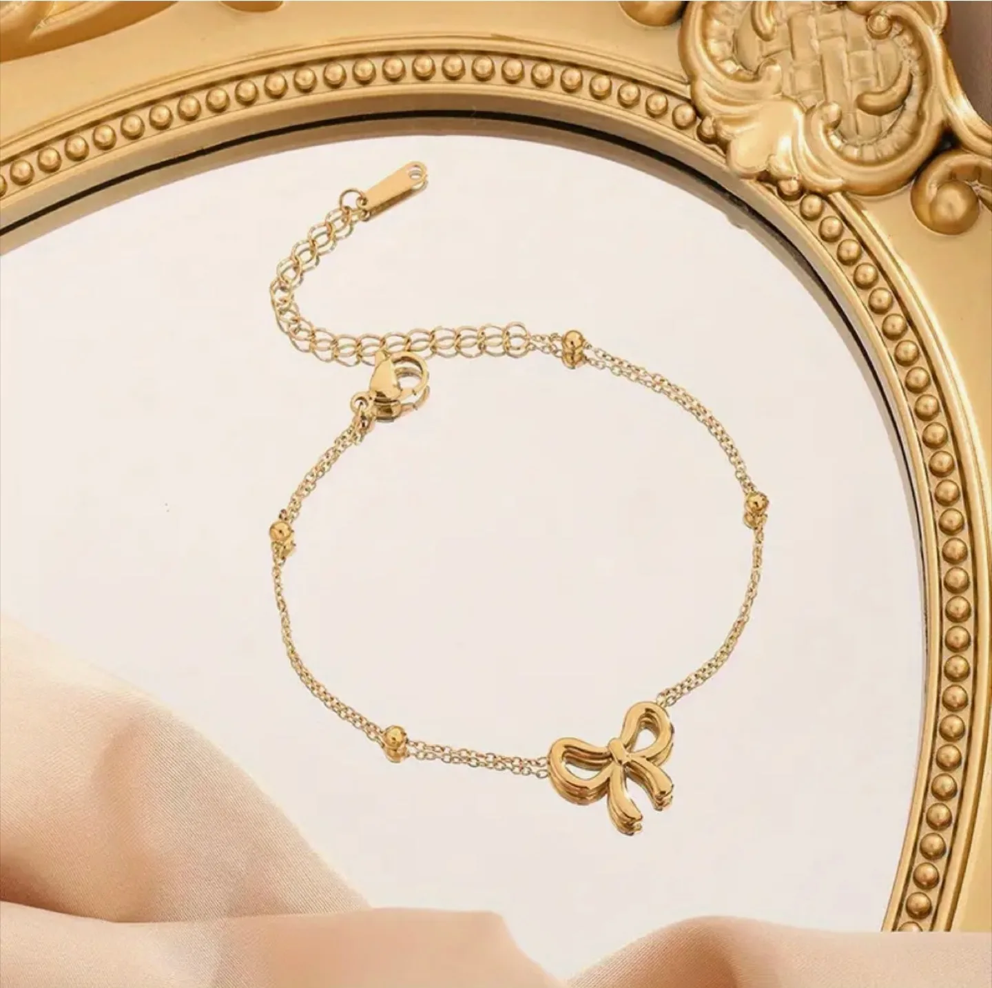 Gold Bow Necklace, Bracelet, and Earrings Set image indicator(3)