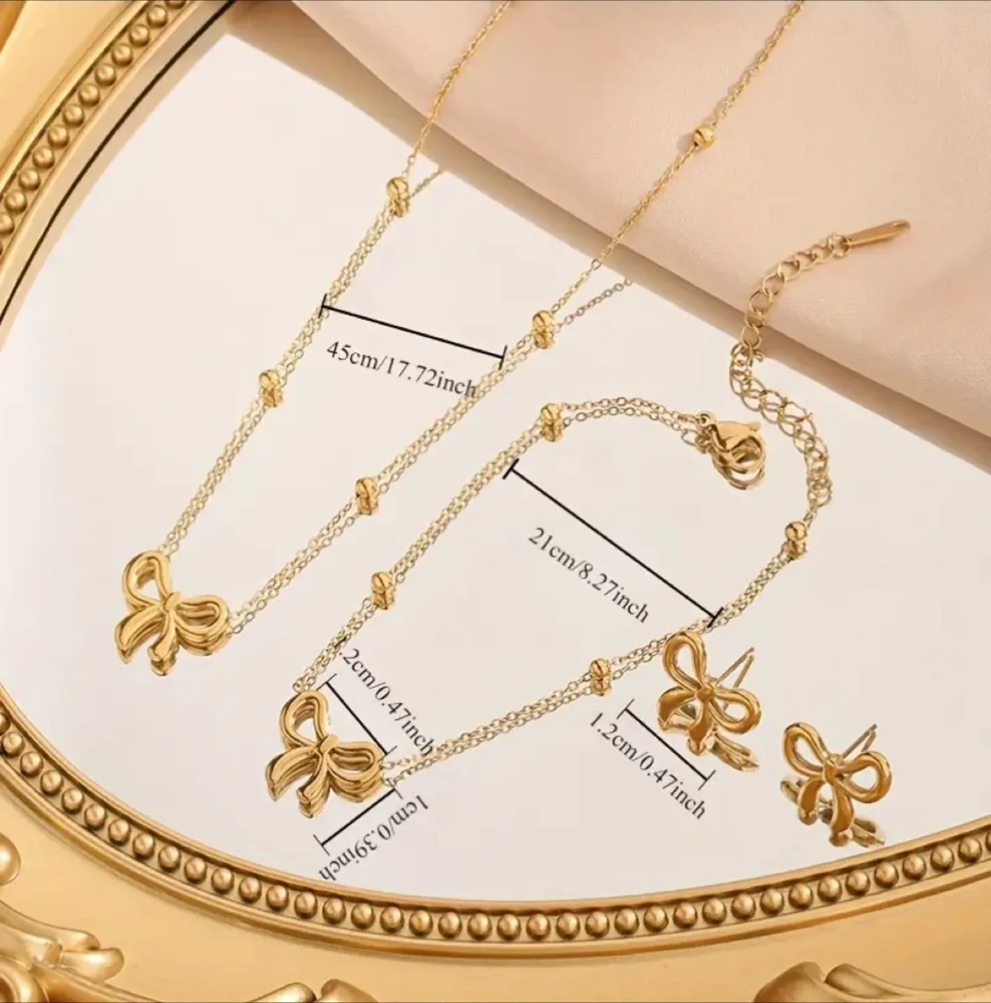 Gold Bow Necklace, Bracelet, and Earrings Set image indicator(6)