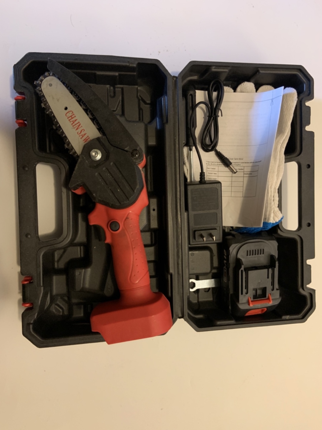 Cordless Chainsaw with Case and Accessories