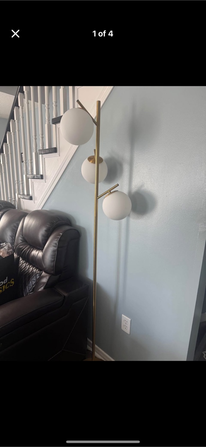 Three-light gold floor lamp