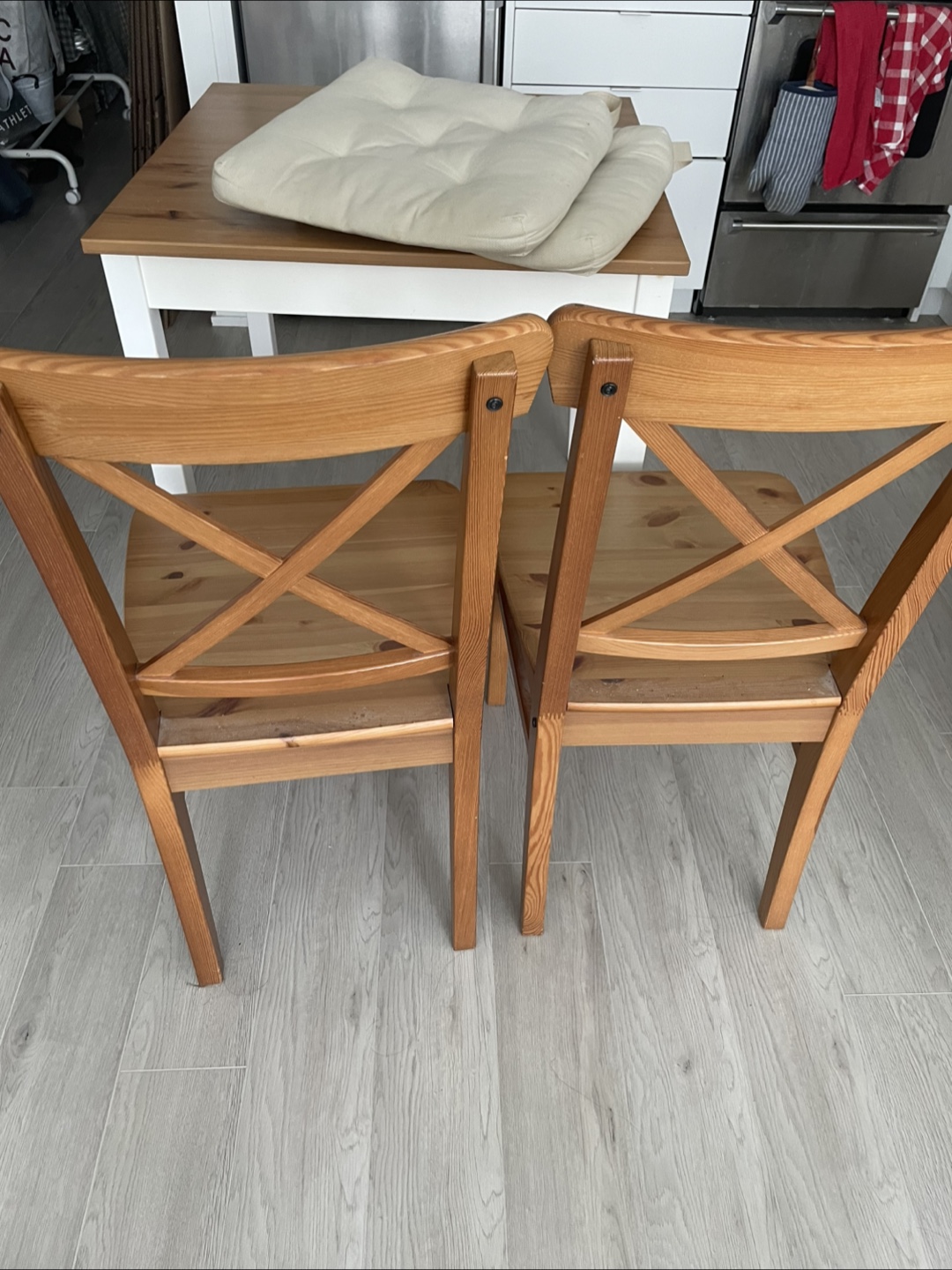 Two IKEA Ingolf wooden dining chairs - photo 3