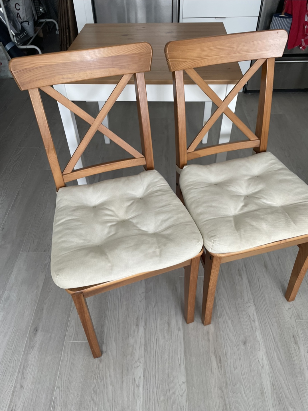 Two IKEA Ingolf wooden dining chairs - photo 2