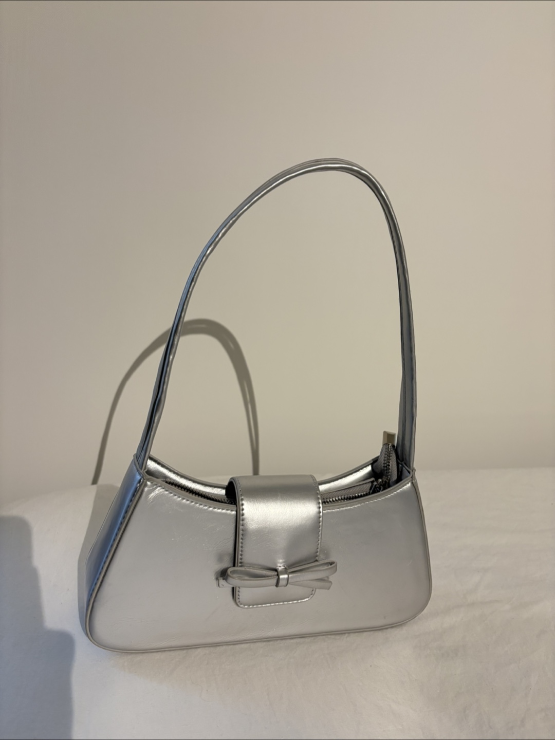 Silver baguette handbag