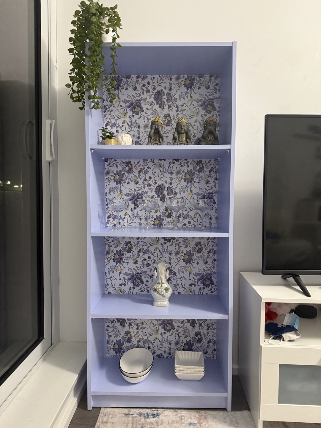 Lilac Bookcase with Floral Wallpaper Accent - photo 2