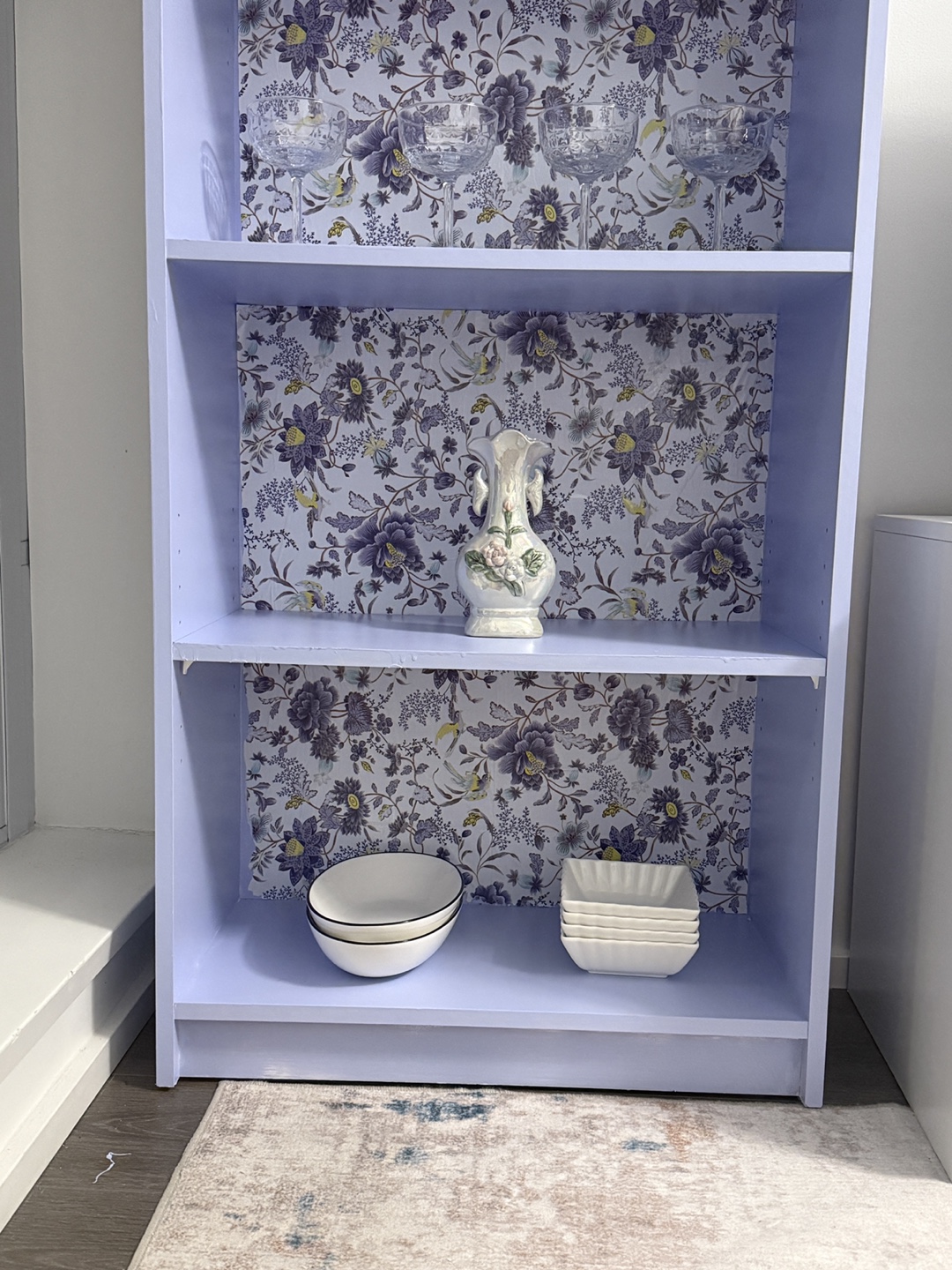 Lilac Bookcase with Floral Wallpaper Accent - photo 4
