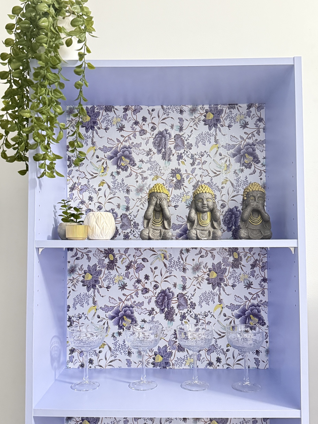 Lilac Bookcase with Floral Wallpaper Accent - photo 3