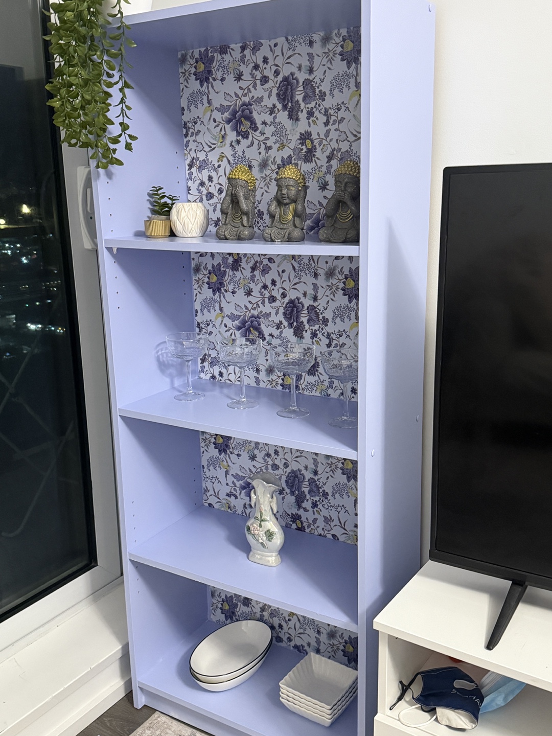 Lilac Bookcase with Floral Wallpaper Accent - photo 5