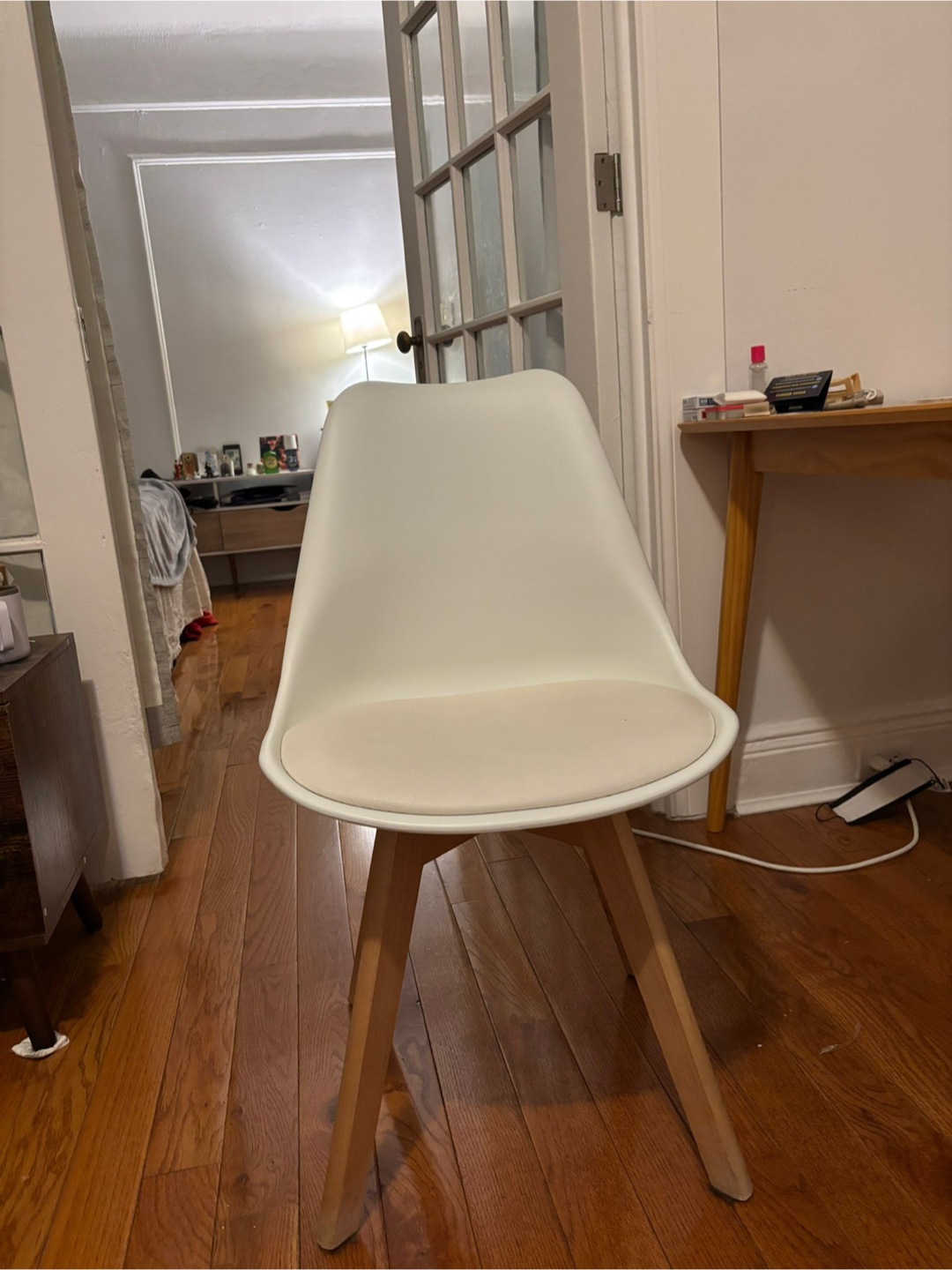 White Plastic Chair with Light Wood Legs