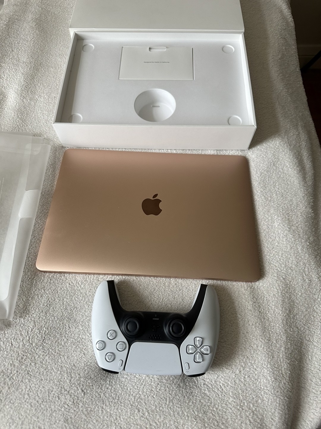 MacBook Air m1, Nintendo Switch Console and ps5 controller