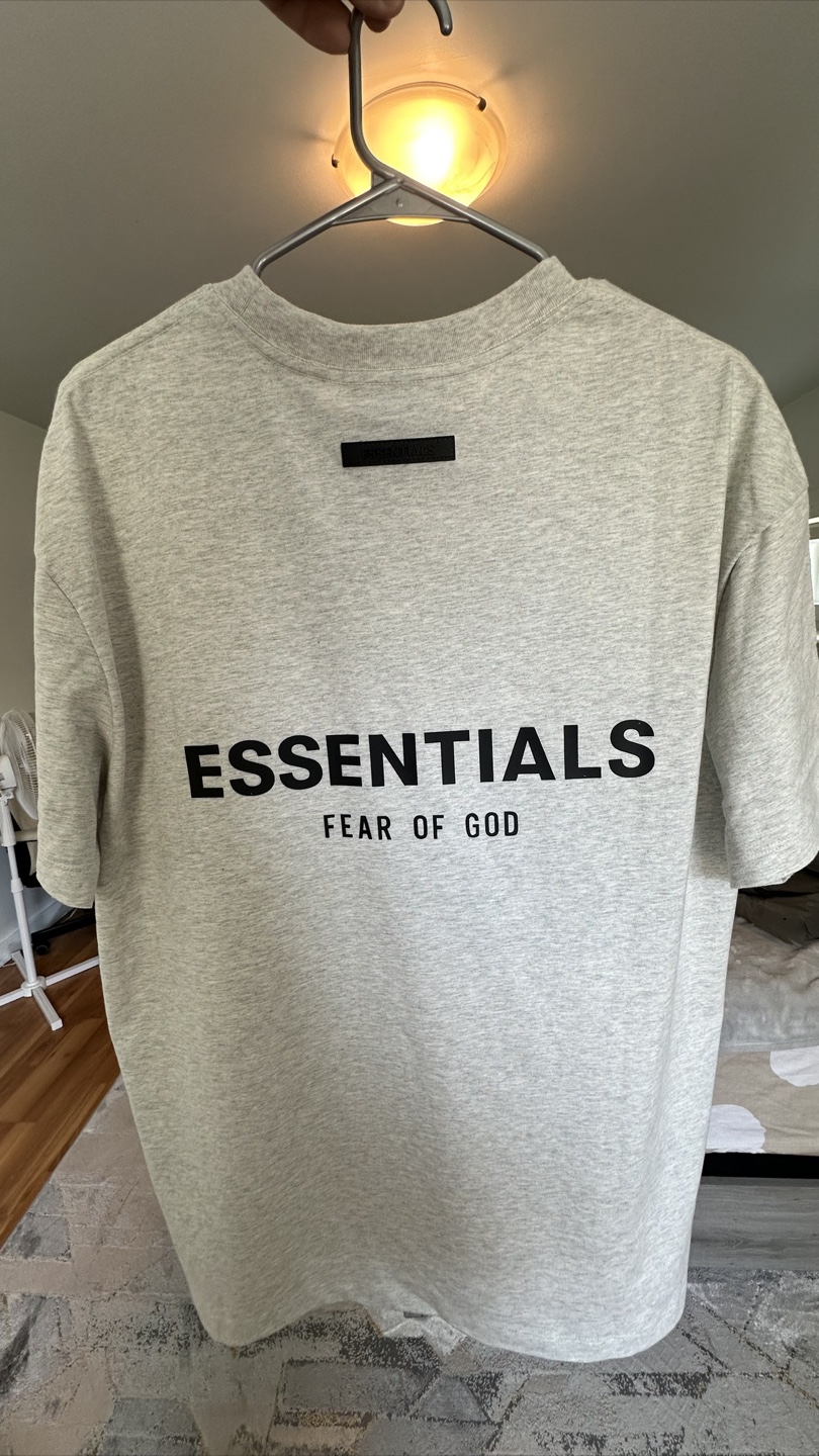 Oversized Fear of God Essentials T-Shirt.
