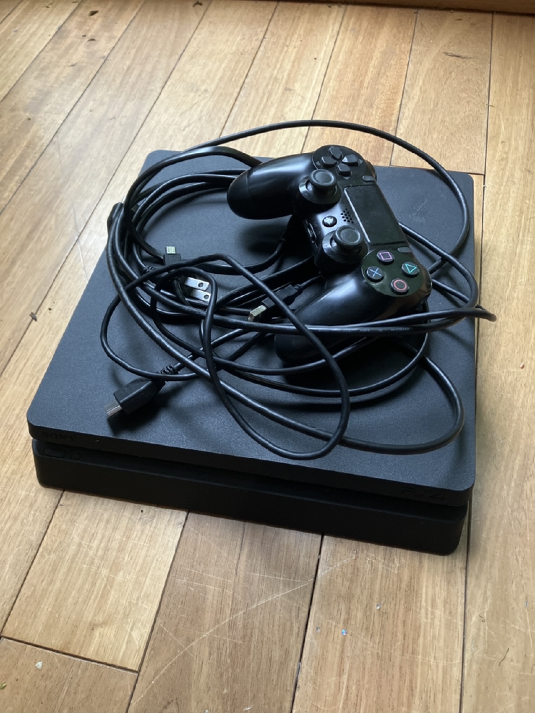 Sony PlayStation 4 Slim Console with Controller and Cables