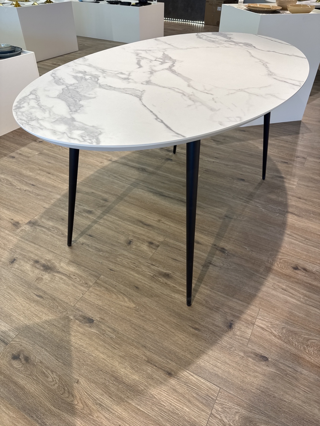 Oval Marble-Top Dining Table with Black Legs