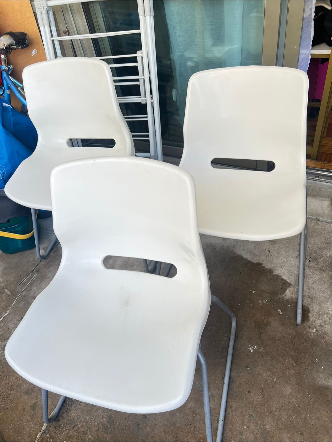 Three White Plastic Chairs price for all of 3