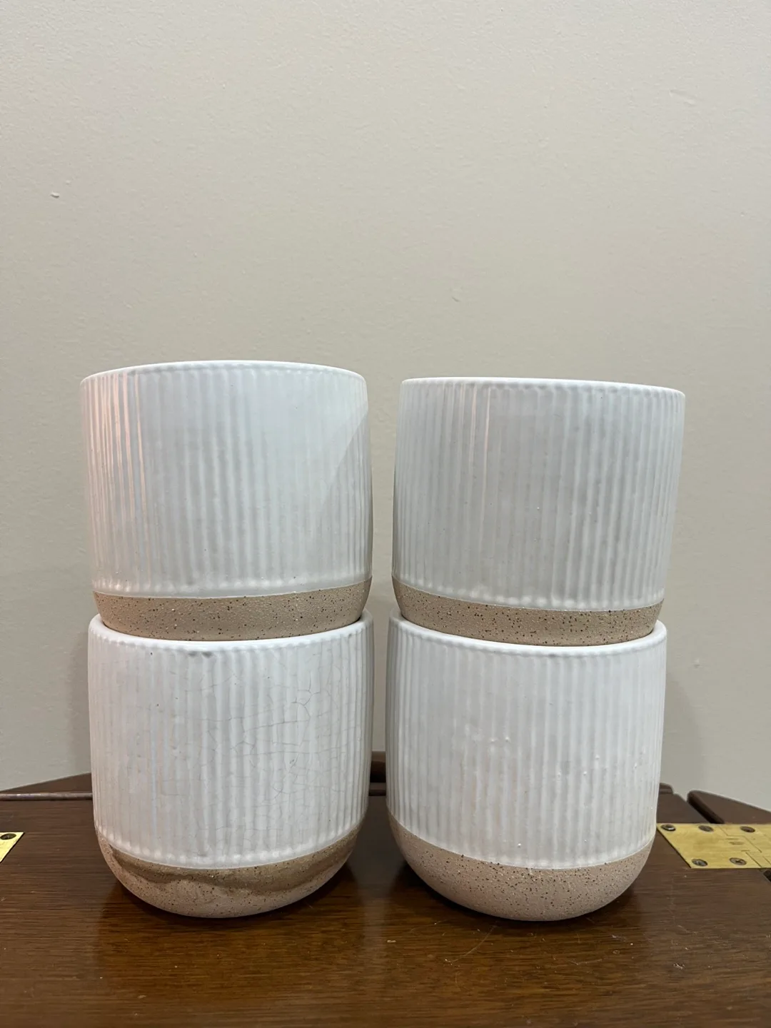 Set of four white ribbed ceramic planters image indicator(2)