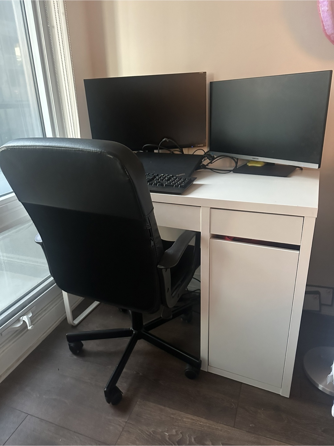 White IKEA Desk with Black Office Chair