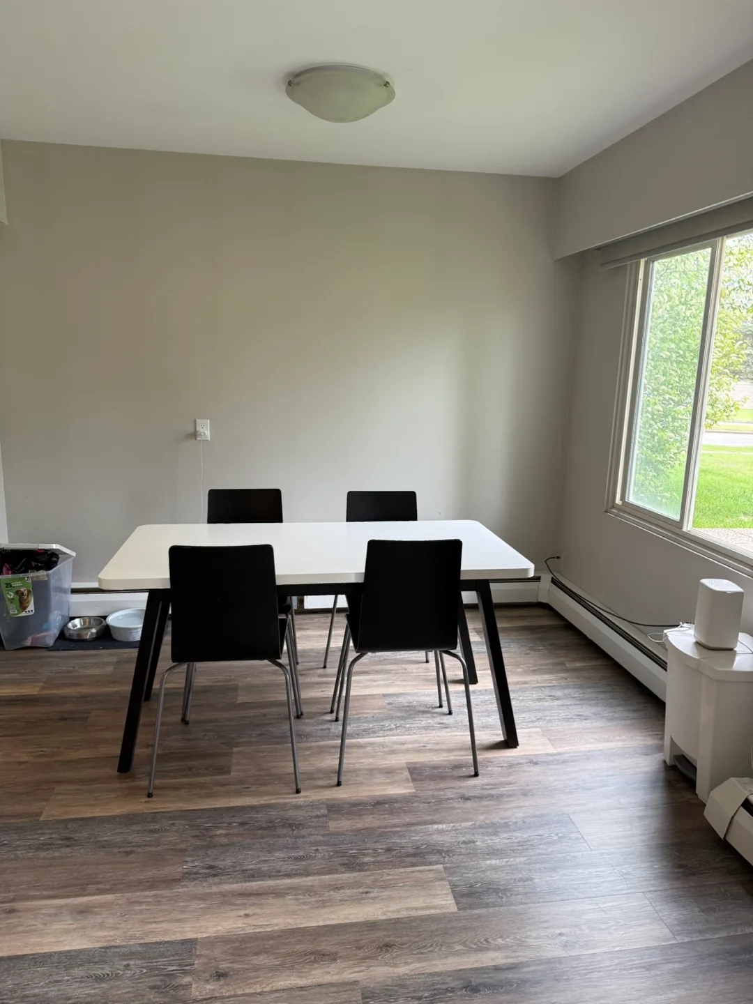 White Ikea Table and Four Black Chairs thumbnail