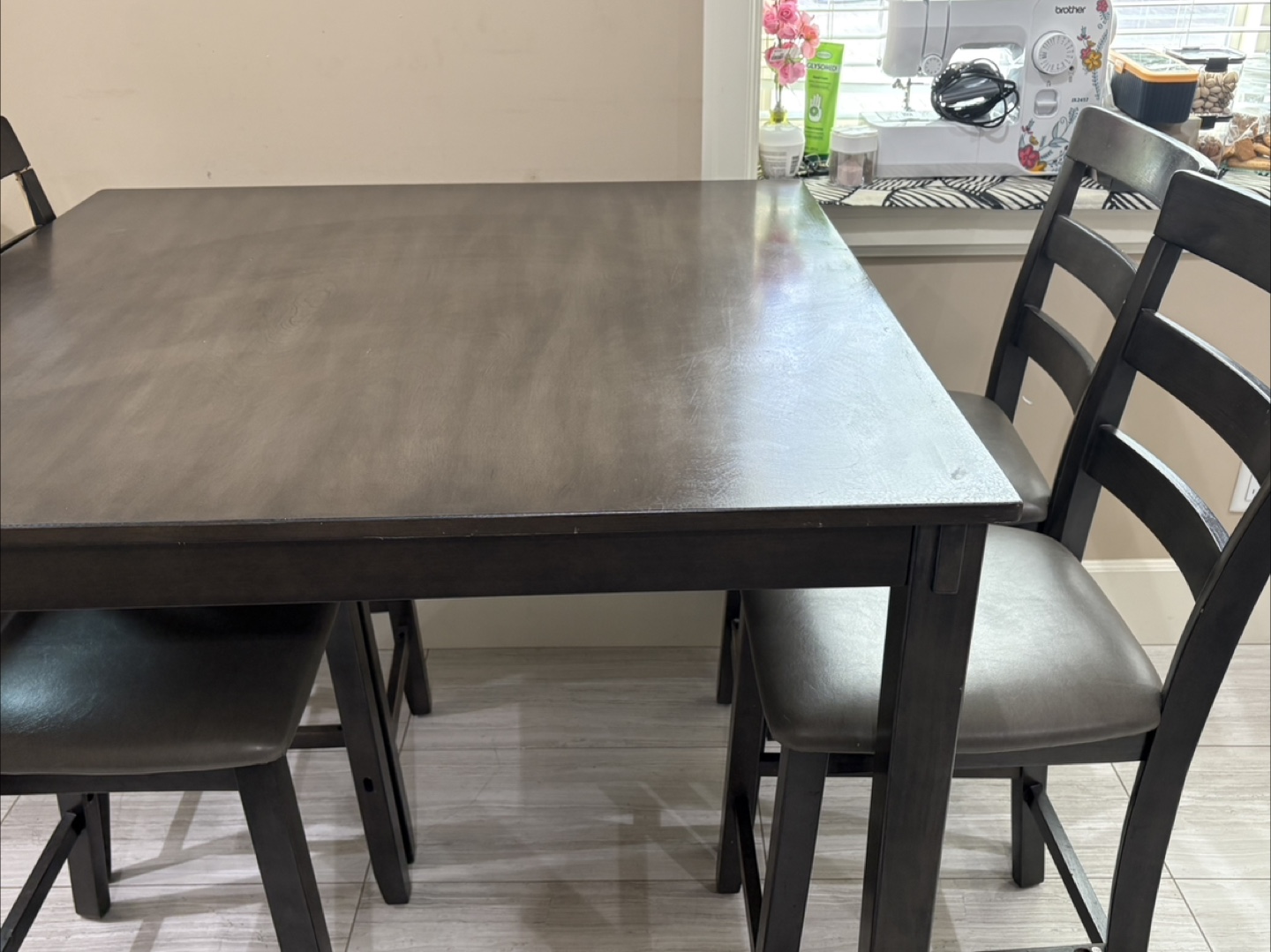 Dark brown kitchen table and four chairs