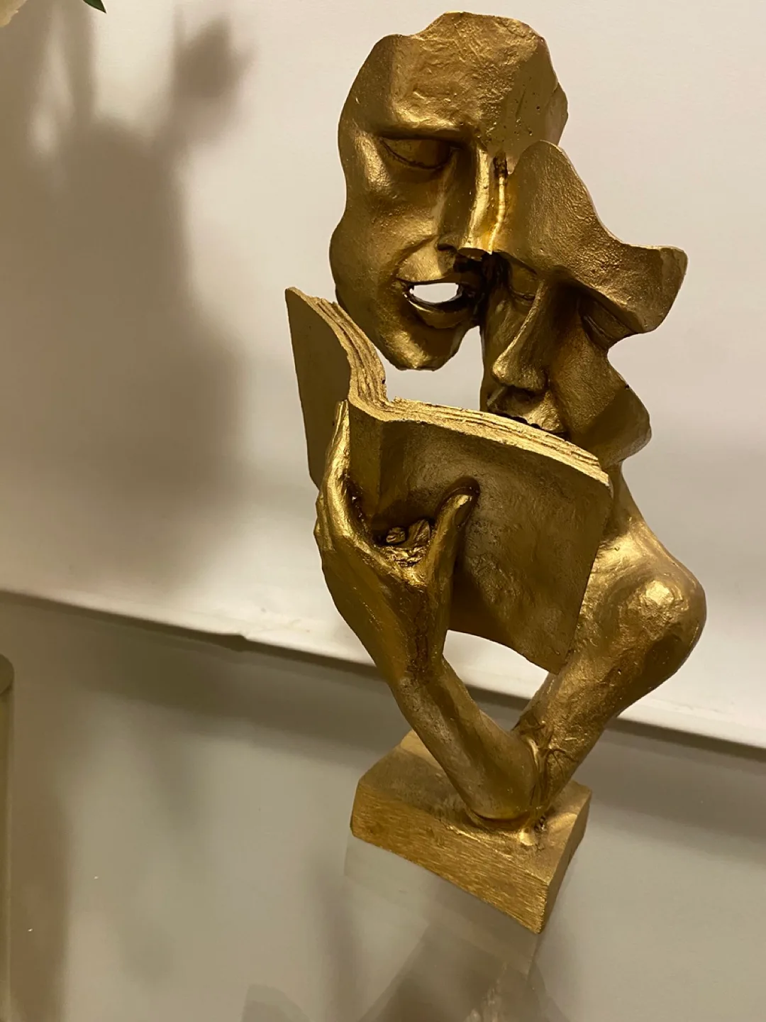 Gold Figurine of Two Faces Reading a Book thumbnail