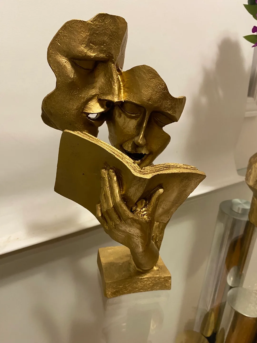 Gold Figurine of Two Faces Reading a Book image indicator(3)