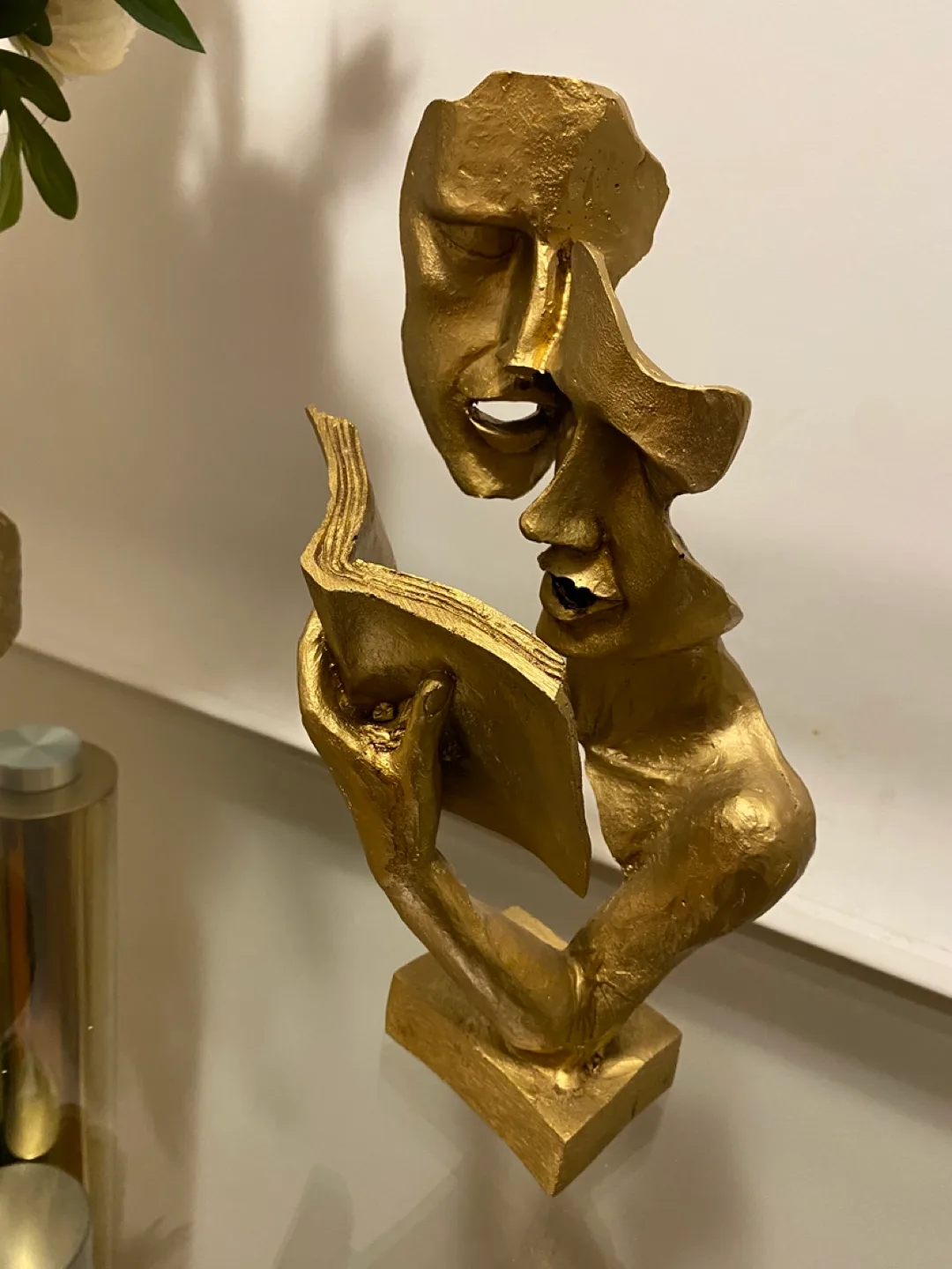 Gold Figurine of Two Faces Reading a Book image indicator(4)