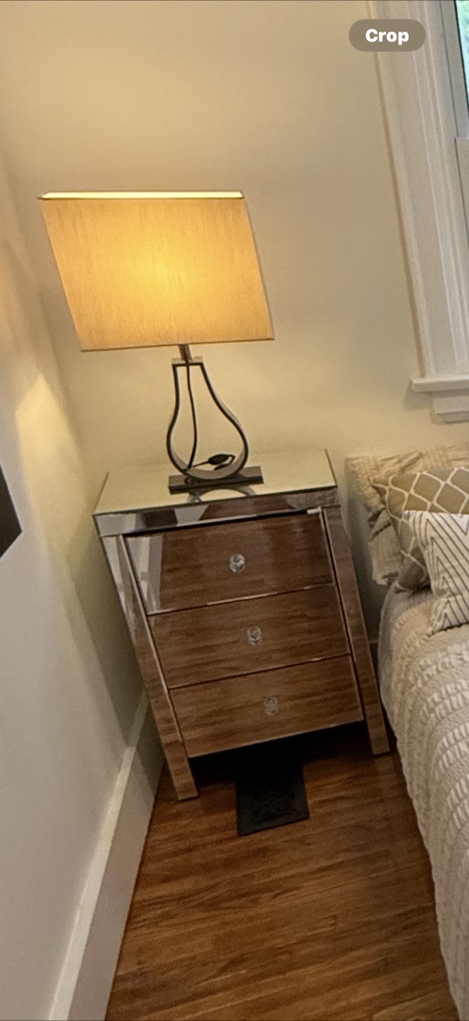 Mirrored Three-Drawer Nightstand with Table Lamp