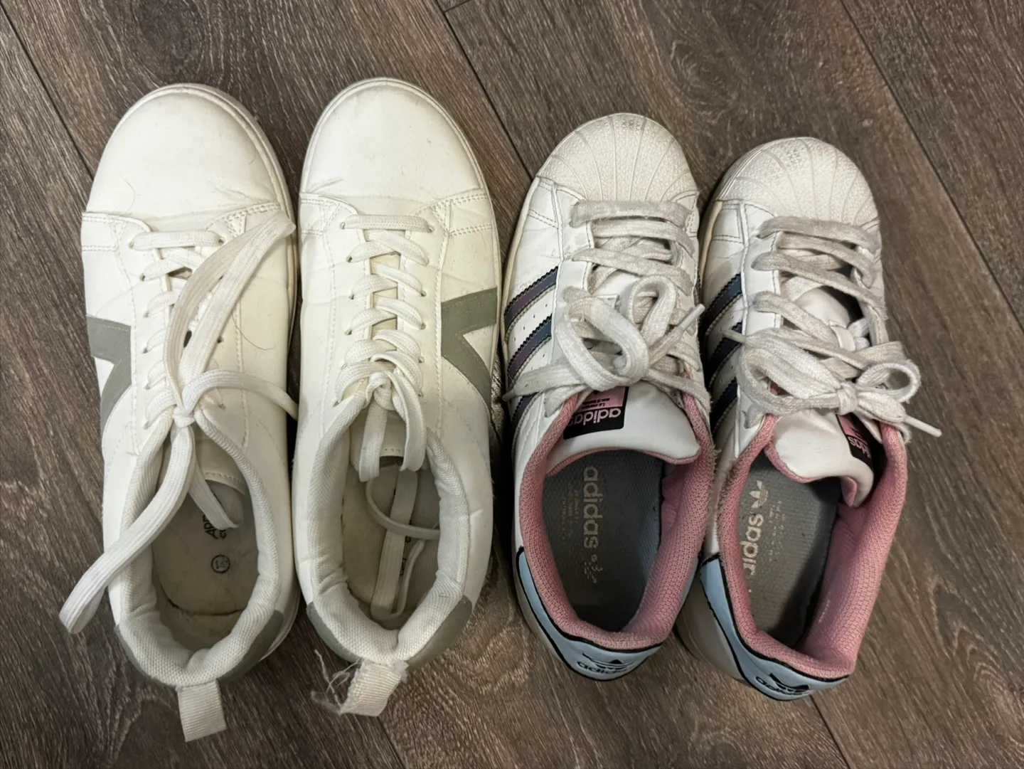 Two pairs of women's white sneakers thumbnail