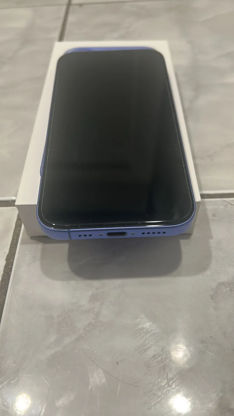 iPhone 16 in blue with Case thumbnail