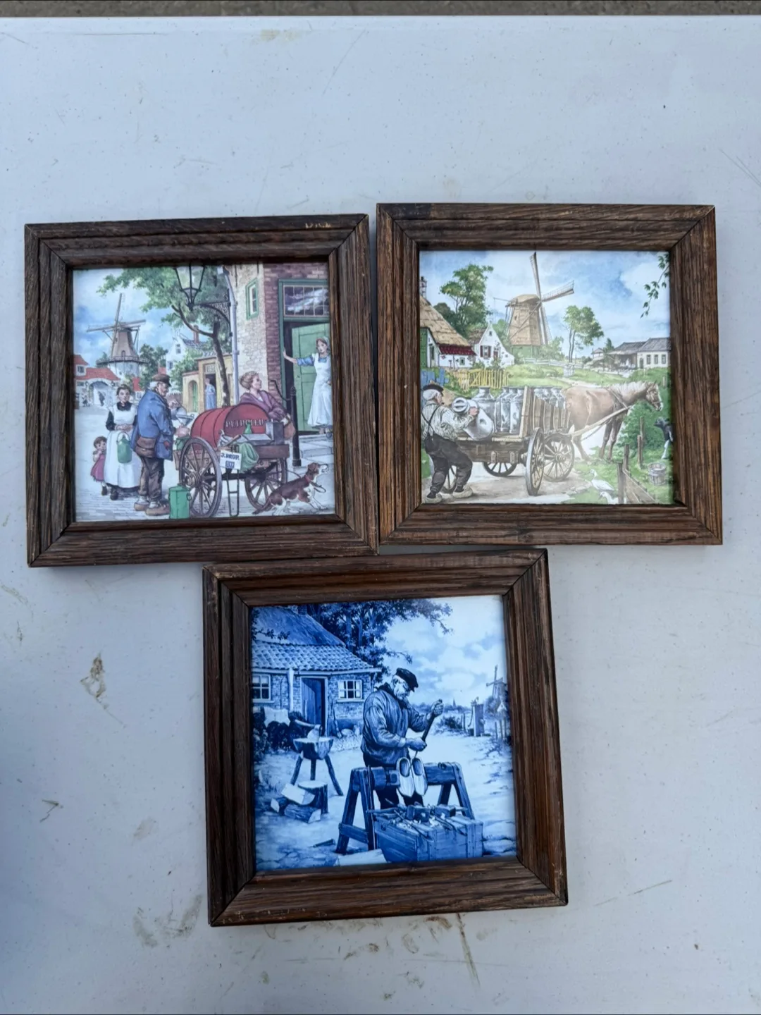 Set of three vintage Dutch scene framed tiles