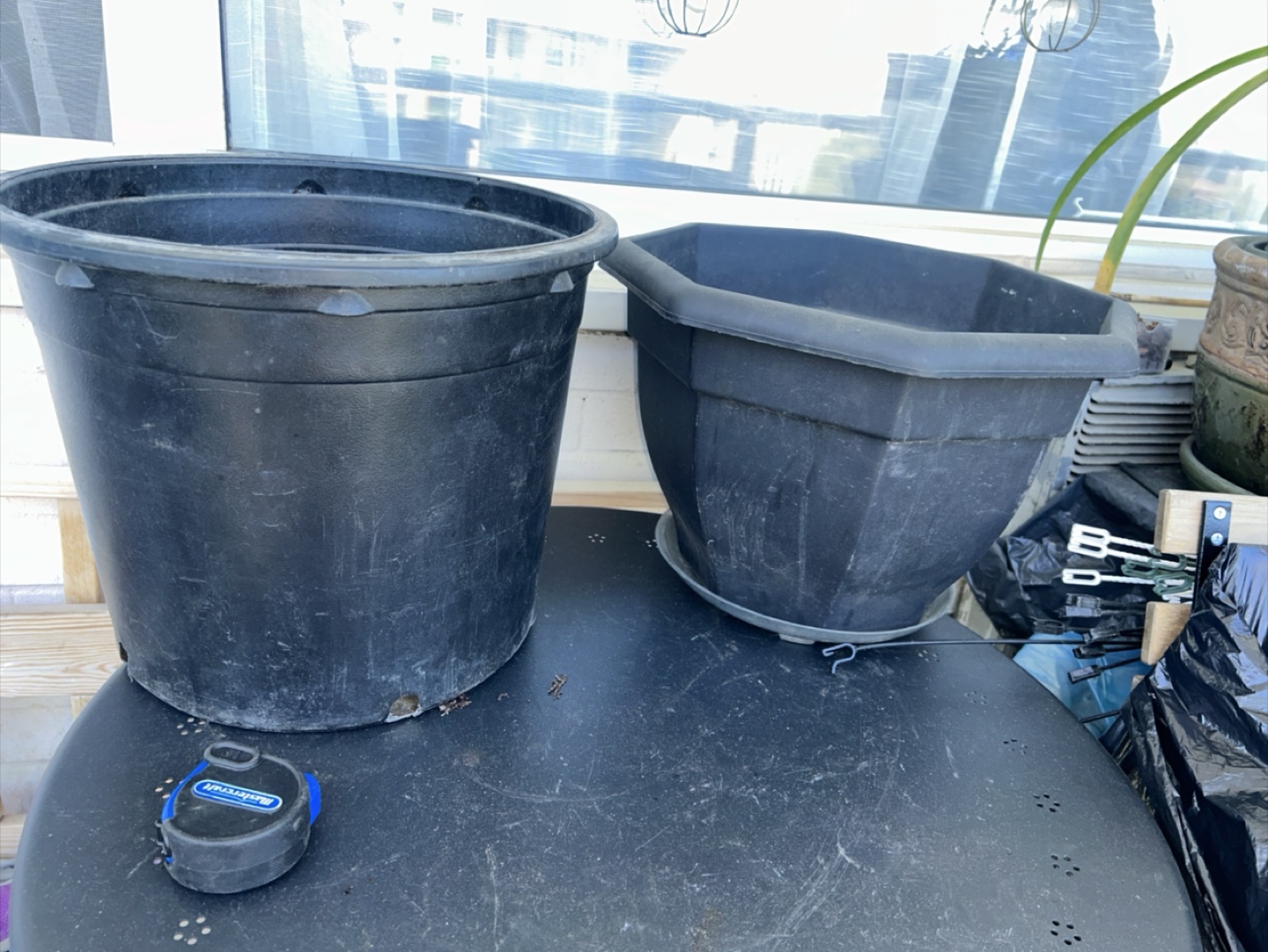 Two Black Plastic Planters